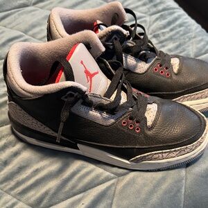 Nike Black and Gray Sneakers with Red Accents